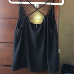 Francesca’s Adorable black tank with cross detail